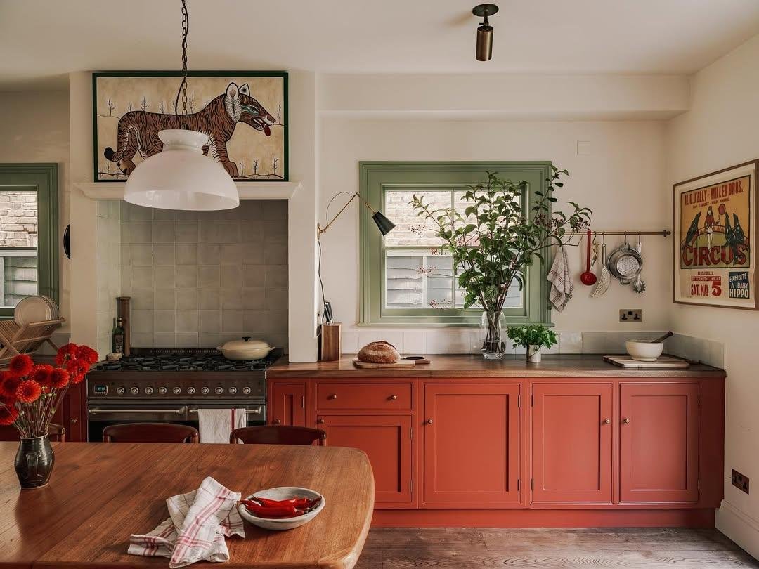 A kitchen spruce up The cupboard fronts were hand painted in a rich warm red from francescasp